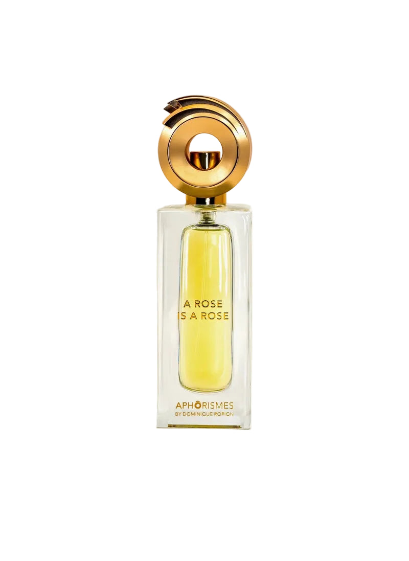 A perfume bottle of Novo Perfumes' "A Rose is a Rose" with a elegant floral design and soft pink accents.