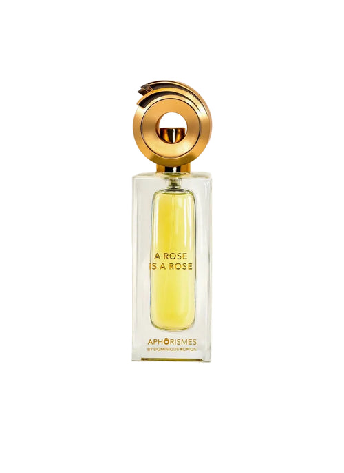 A perfume bottle of Novo Perfumes' "A Rose is a Rose" with a elegant floral design and soft pink accents.