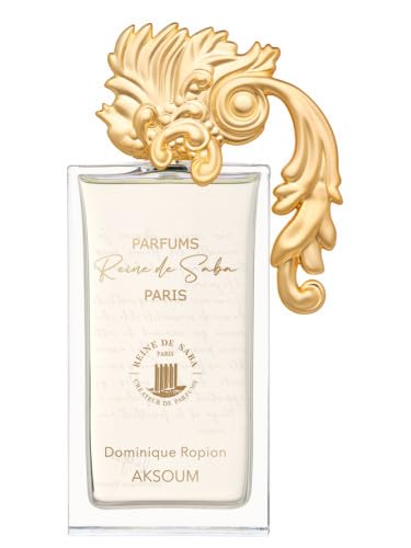 AKSOUM perfume by Novo Perfumes, elegant glass bottle with gold accents, showcasing a luxurious fragrance presentation.