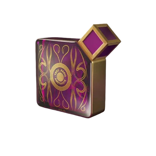 Amethyste perfume bottle by Novo Perfumes, elegant glass container with a purple-hued cap, displayed on a neutral background.