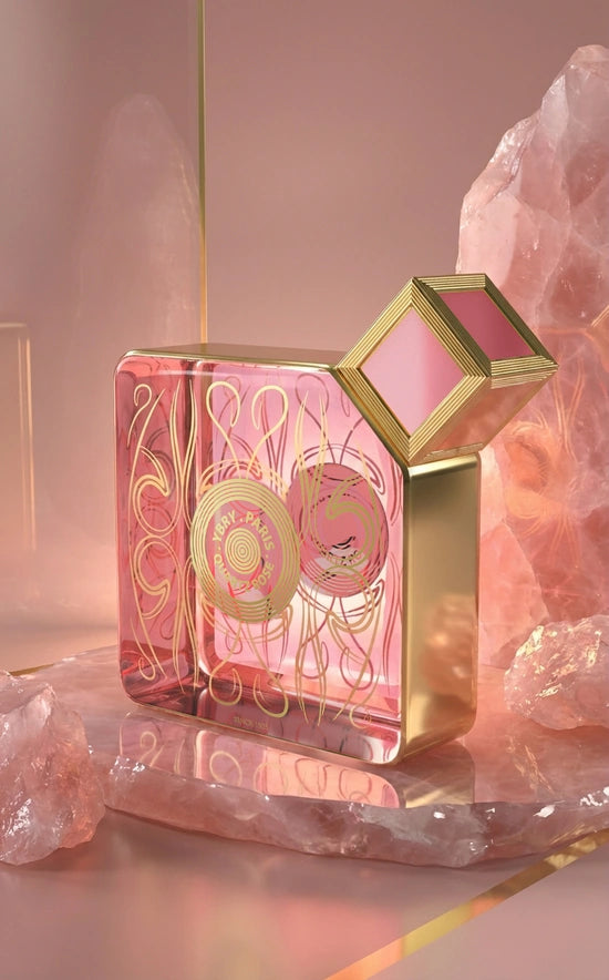 Pink quartz gemstone from Novo Perfumes with a smooth, polished surface, showcasing its soft pink hue and natural crystal clarity.