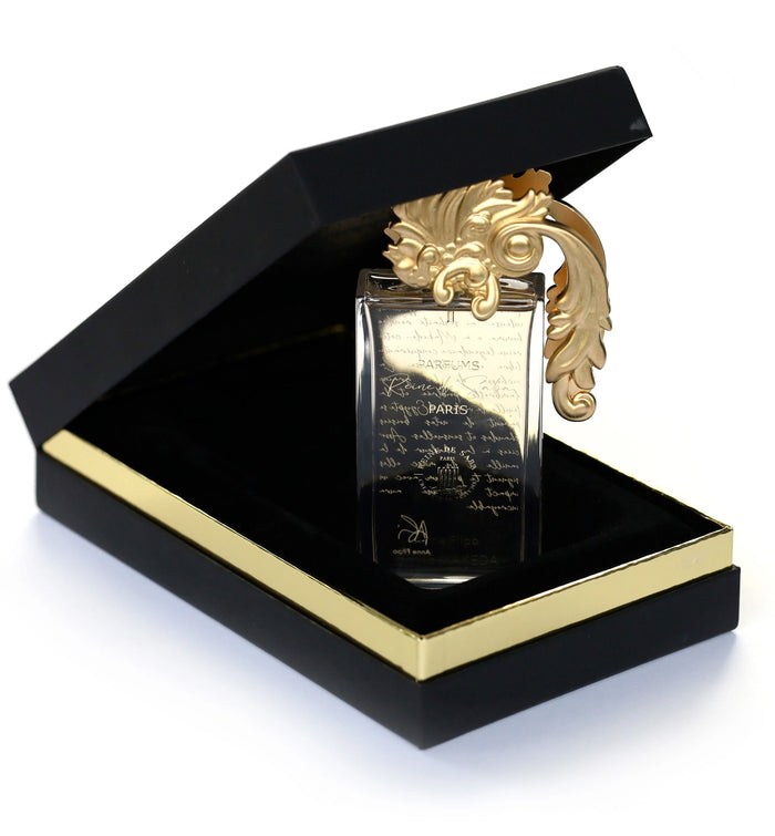 Saba Rose D'Or perfume by Novo Perfumes, featuring a luxurious floral fragrance bottle with gold accents.
