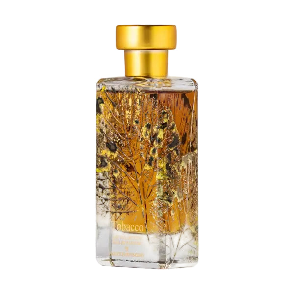 Bottle of Novo Perfumes Tobacco fragrance with a sleek design, showcasing the elegant label and dark-colored liquid inside.