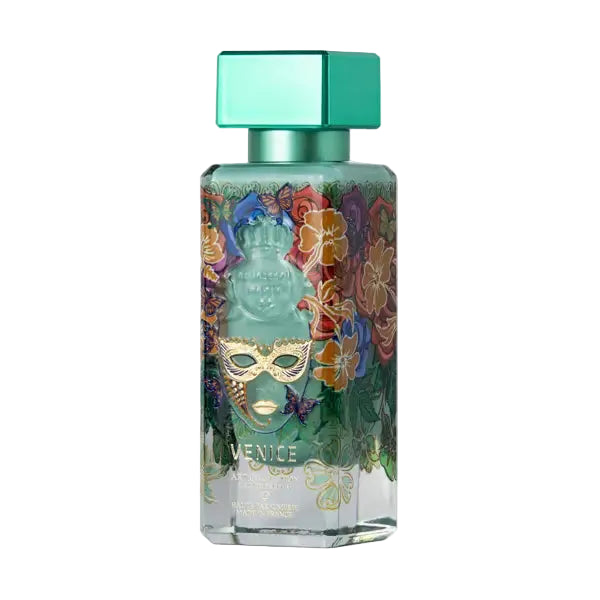 Elegant bottle of Novo Perfumes Venice fragrance with intricate design, set against a neutral background.